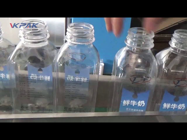 Máquina automática de etiquetado de botellas cuadradas de plástico de doble cara