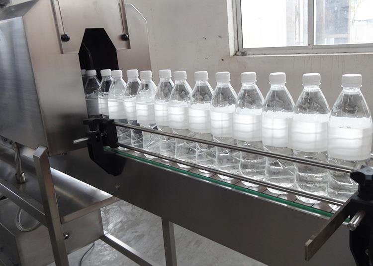 Máquina automática de etiquetado de botellas de manga retráctil de PVC
